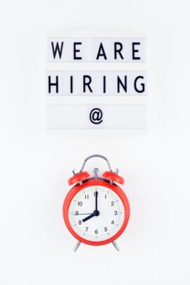 We are hiring flat lay on white background
